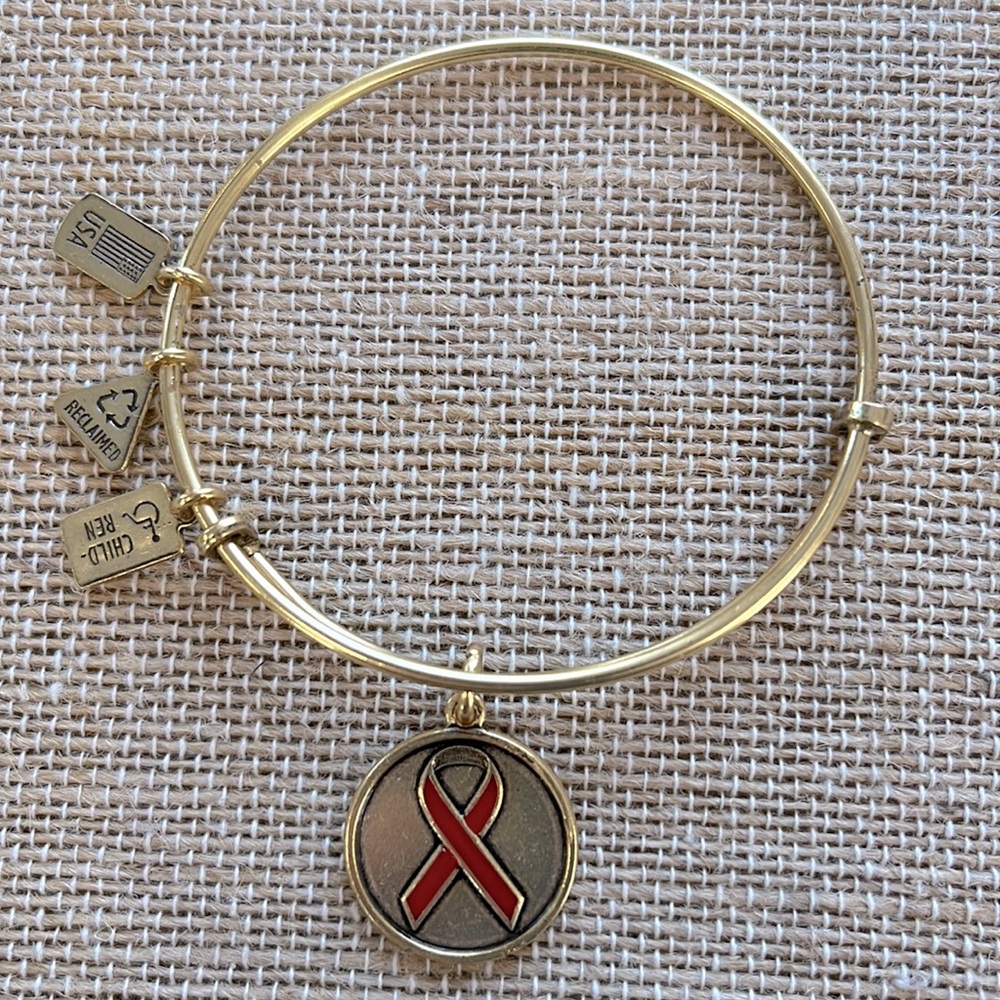 Wind and Fire Red Ribbon Gold Tone Bracelet
